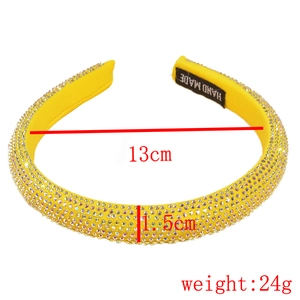 Detail showing dimensions of 1.5cm wide yellow rhinestone headband with handmade tag
