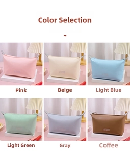 Close-up of waterproof PU leather cosmetic bags in six trendy colors with side handles