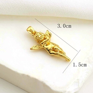 Detailed view of a golden Cupid angel pendant measuring 3.0cm by 1.5cm on white fabric