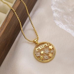 Elegant gold-plated MAMA pendant necklace with zircon stars on wood jewelry box