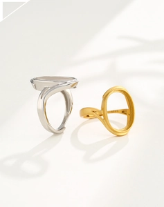 Detailed macro view of S925 sterling silver oval ring settings in silver and gold finishes