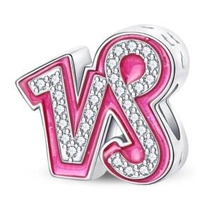 Macro detail of silver bead with pink enamel and sparkling pavé synthetic zirconia