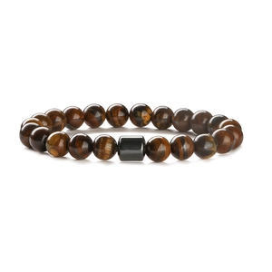 Macro shot of natural Tiger Eye stone beads with a dark grey metal cylinder bead