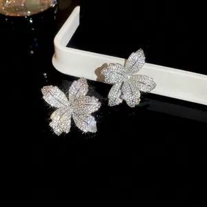 Elegant silver flower stud earrings with brilliant cubic zirconia in full pavé setting