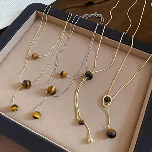 Tiger eye stone pendant necklaces in gold and silver finish with minimalist snake chains