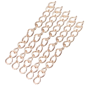 Detailed view of rose gold extension chains with oval links for jewelry DIY crafting