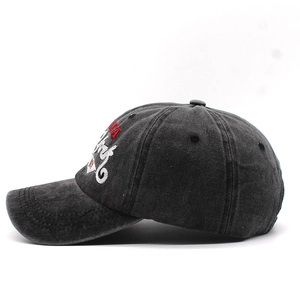 Detail shot of side embroidery on vintage washed cotton baseball cap with USA York design