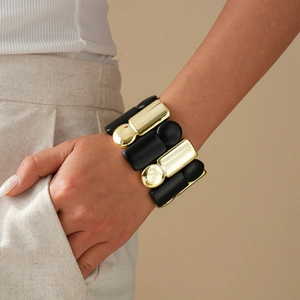 Chunky acrylic and gold metal stretch bracelet with matte black and polished square blocks