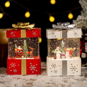 Christmas musical snow globe gift box with Santa Claus, reindeer, and warm LED lighting