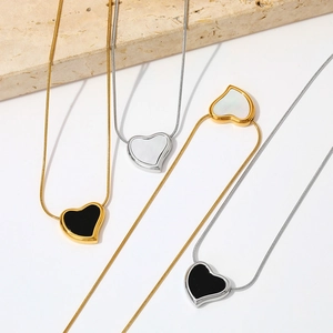Elegant stainless steel heart pendant necklaces in gold and silver finishes with shell inlay