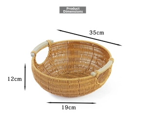 Top view of woven fruit basket with dimensions 35cm diameter and wood handles