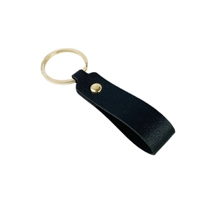 Minimalist black leather keychain with premium golden ring and rivet for car keys