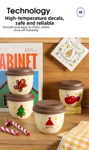 Detail of Christmas ceramic espresso cup with Santa print and brown silicone lid
