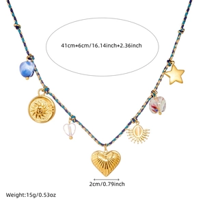 Bohemian braided cord necklace with gold-plated sun and heart pendants on white background