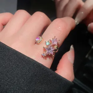 Elegant rose gold open ring featuring pink star zircons and multi-color crystal accents