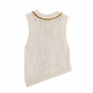 Sleeveless cream knit vest featuring a gold chain collar and asymmetric hem design