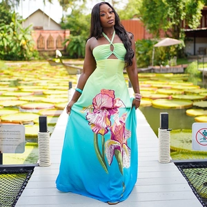 Halter neck gradient maxi dress with large floral prints and waist-cinching A-line cut
