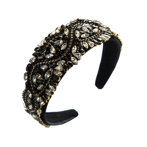 Detailed side view of baroque headband featuring crystals and gold bead embellishments