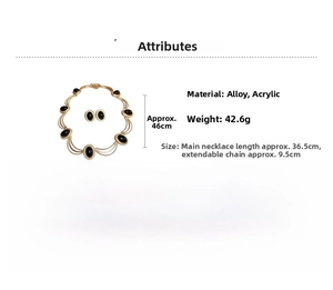 Detailed view of vintage gold alloy necklace and oval acrylic earrings set