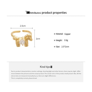Detailed view of horse-shaped ring with heart zircon and copper size specifications