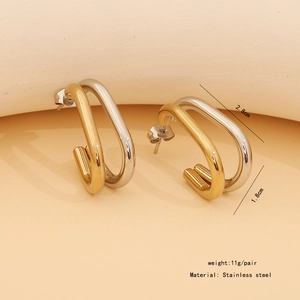Detail view of two-tone stainless steel J-shaped earrings with dimension and weight specs