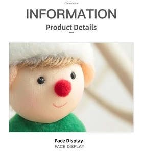 Close-up of Christmas elf doll face with plush white hat and red pom-pom nose detail