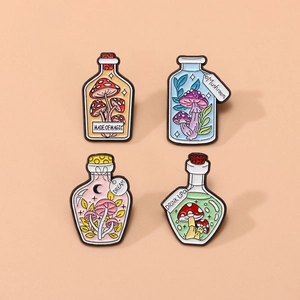 Set of four colorful enamel pins featuring magical mushroom potion bottles with stars