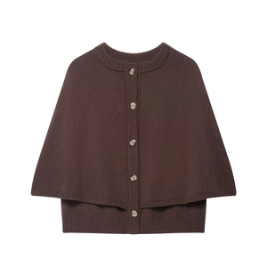 Close-up of a dark brown knit poncho cardigan with a double-layered design and five buttons