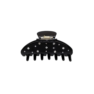 Detail of a black hair claw clip with rhinestones and metal spring mechanism