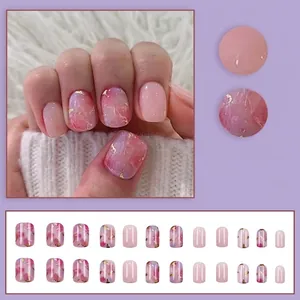 Pink marble ombre press-on nails with gold foil accents, full 24-piece set for women
