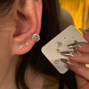 Gold plated sterling silver stud earrings set featuring round and square cubic zirconia