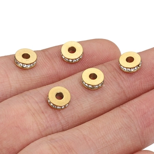 Flat 18k gold plated stainless steel spacer beads with white rhinestones on fingertips