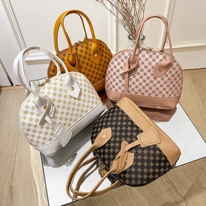 Retro Boston shell handbag for women featuring litchi grain leather and vintage prints