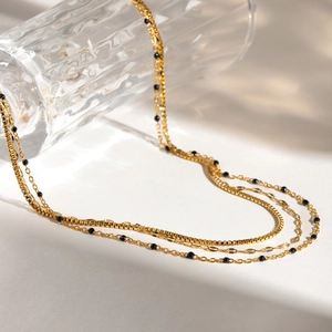 Three-layer gold stainless steel necklace with box chain, flat chain and black beads