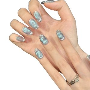 Ice blue ocean cat-eye handmade press-on nails with silver glitter border decoration