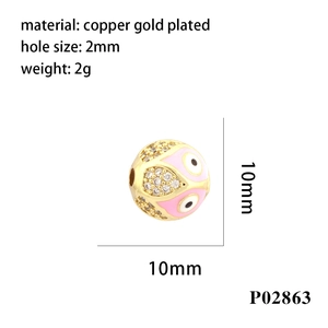 Detail showing 10mm pink enamel evil eye charm bead with gold plating and clear zircon