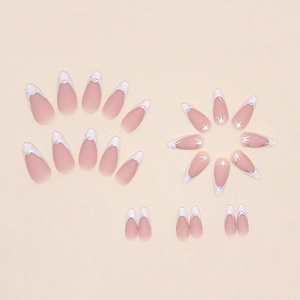 French white almond fake nails with silver line accents and nude gradient finish