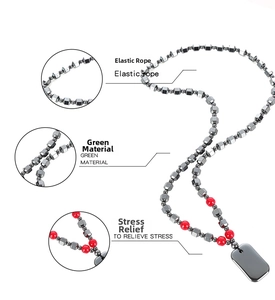 Detail view of hematite beaded necklace with elastic cord and stress relief features