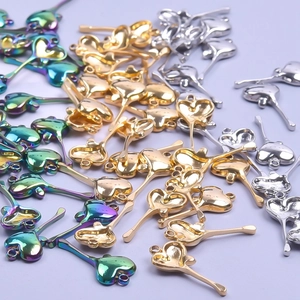 Polished stainless steel heart pendants in gold, silver, and rainbow colors for DIY jewelry