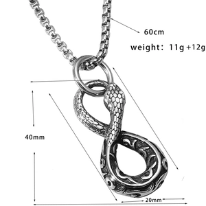 Close-up of a silver snake pendant necklace with 60cm chain and 40mm pendant dimensions