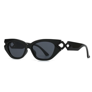 Fashion cat-eye sunglasses in black frame with dark grey lenses and geometric cut-out arms