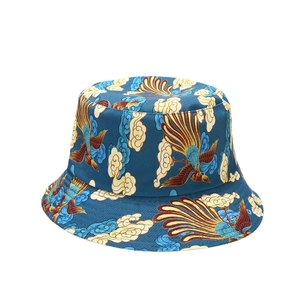 Navy blue reversible bucket hat with traditional golden phoenix and auspicious cloud patterns