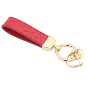 Red braided leather keychain with gold metal ring and buckle on a white background