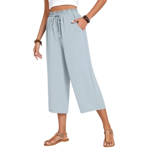 Detail of high waist linen trousers with adjustable drawstring and side pockets in grey-blue