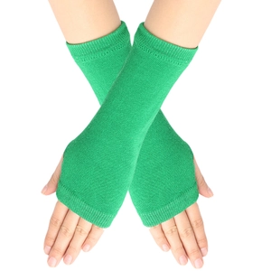 Close-up of vibrant green knitted fingerless arm warmers with thumb hole detail