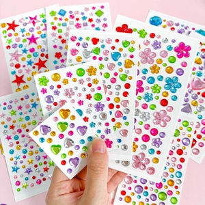 Colorful gemstone stickers in heart, star, and flower shapes for kids DIY craft decor
