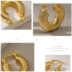 Detail view of 18K gold plated threaded earrings with high-mirror polishing and texture