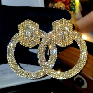 Exaggerated golden double circle earrings with luxury rhinestones for high-end fashion wear