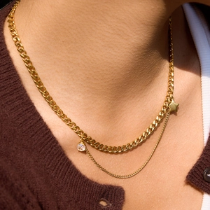 Double-layered 18K gold plated stainless steel necklace with star and zircon pendants