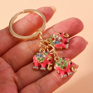 Modischer goldener Elefant Schlüsselanhänger mit rosa Anhängern und bunten Strasssteinen